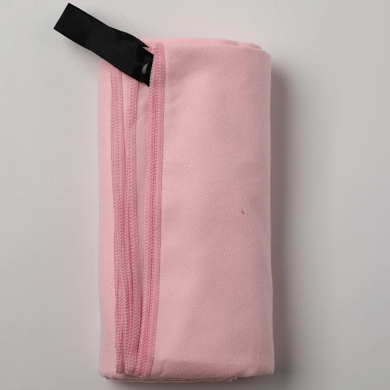 SwiftHaven quick-dry beach towel in use